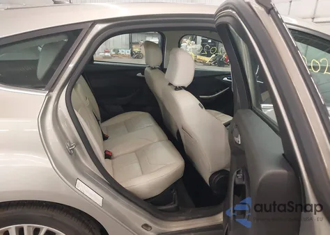 2016 Ford Focus Titanium z USA, uszkodzony, nr VIN 1FADP3N28GL326197